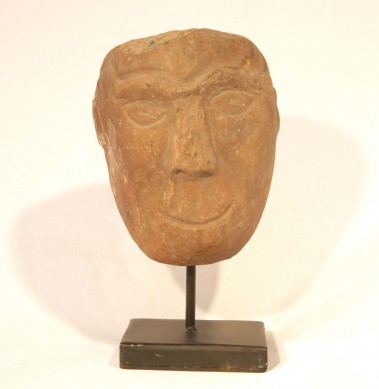 Stone head by Timor Carving
